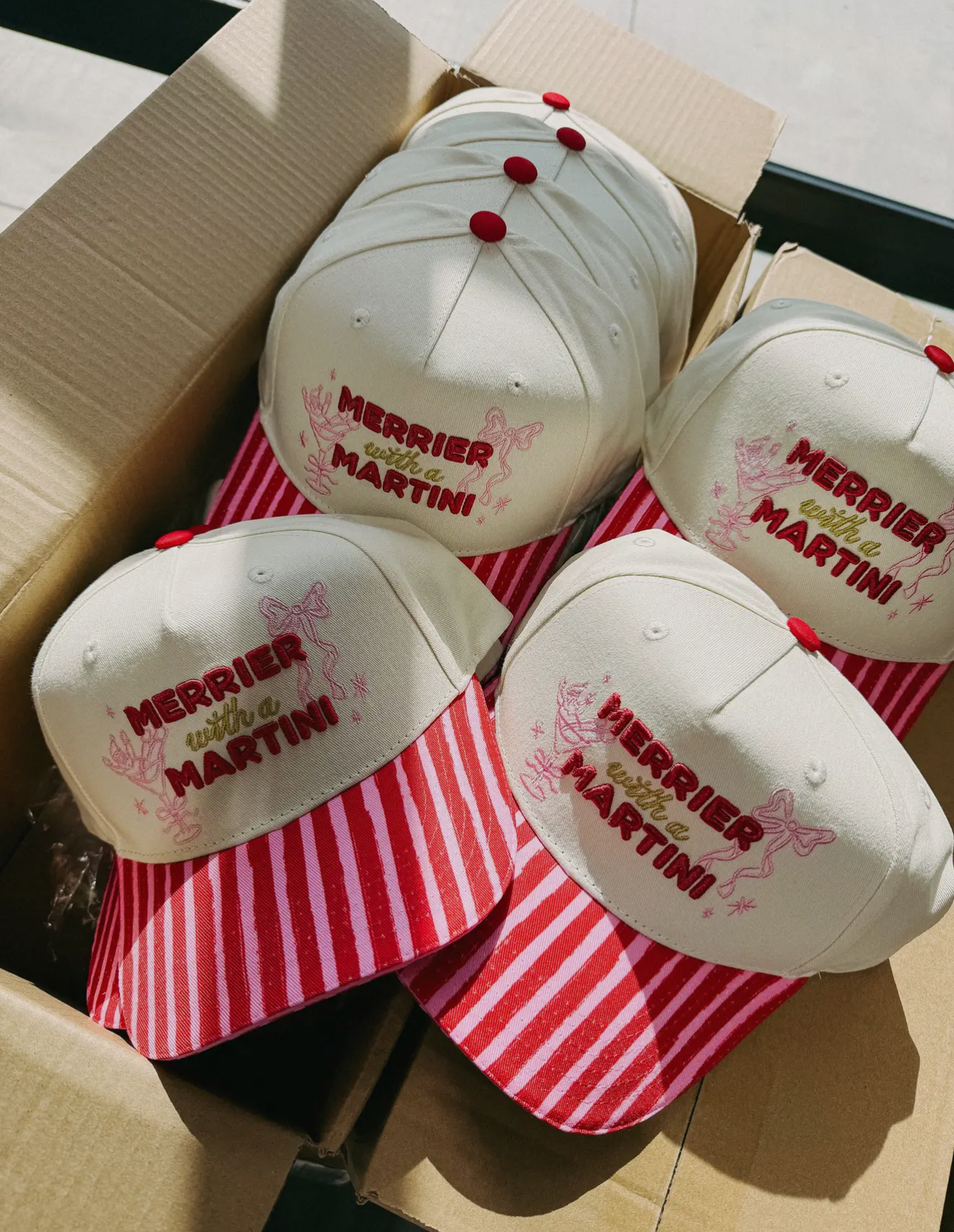 MERRIER WITH A MARTINI HAT