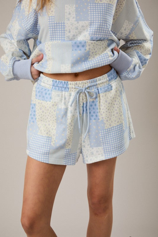 PATCHWORK PRINT SWEATSHORTS