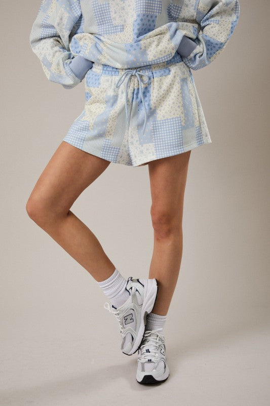 PATCHWORK PRINT SWEATSHORTS