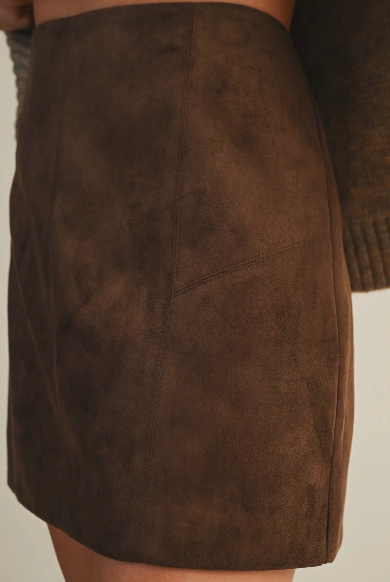 PRETTY IN BROWN SKIRT
